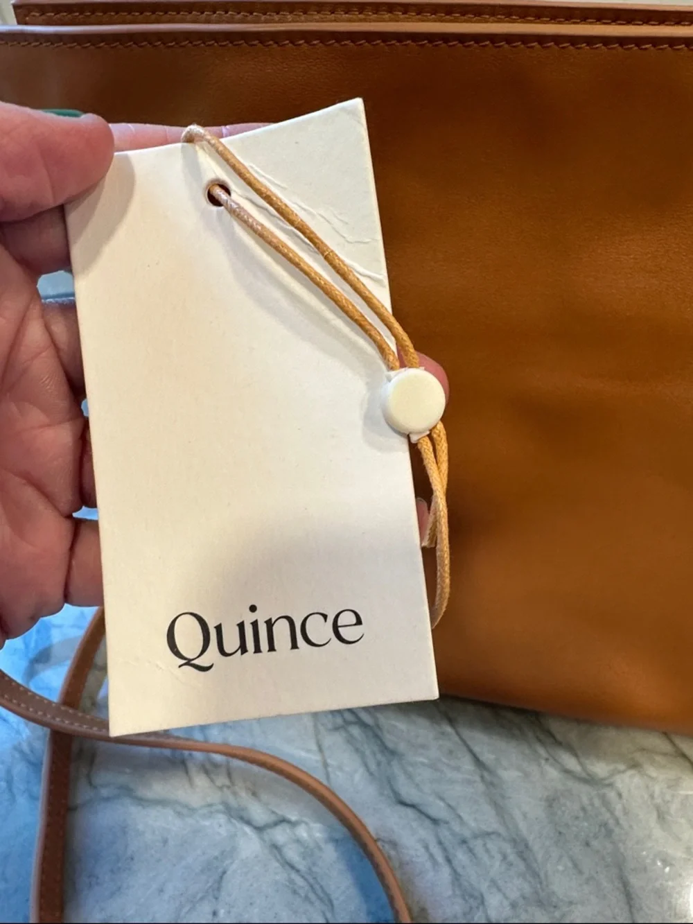 Quince Italian Leather Drawstring Pouch Crossbody Bag in Cognac - Picture 3 of 16